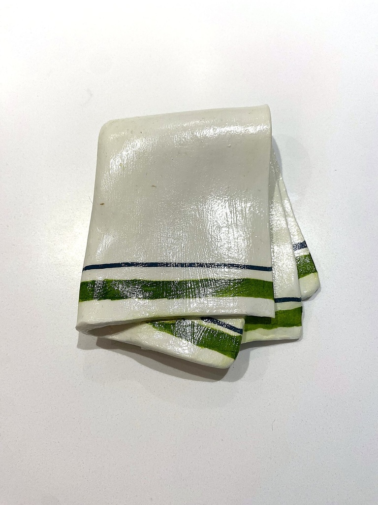 Repose cuillère torchon plié